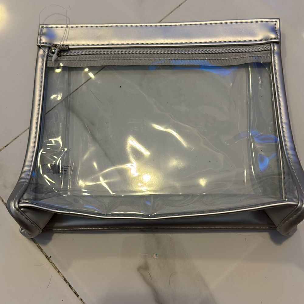 Silver Lord and Taylor cosmetics bag